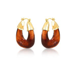ARGOLA OVAL E ABAULADA EM RESINA