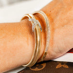 BRACELETE TRANÇADO E TEXTURIZADO COM ZIRCÔNIAS