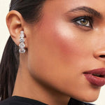 BRINCO EAR HOOK CURVO COM ZIRCÔNIAS REDONDAS